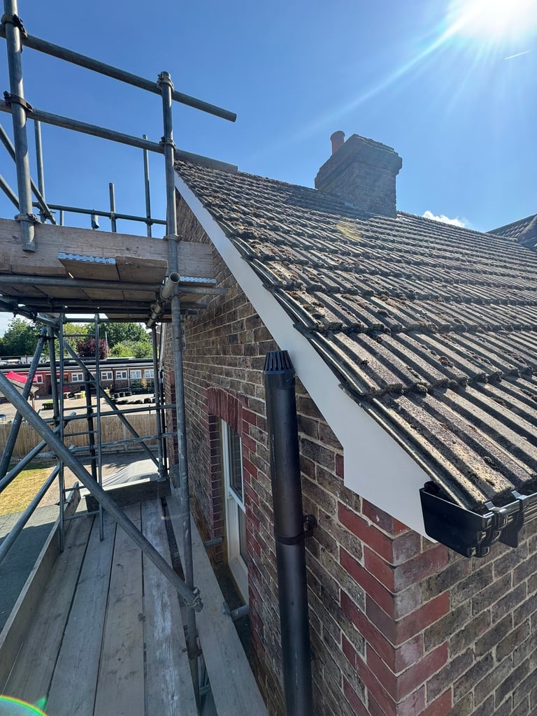 Damaged gable verge before repair at a property in Burgess Hill.